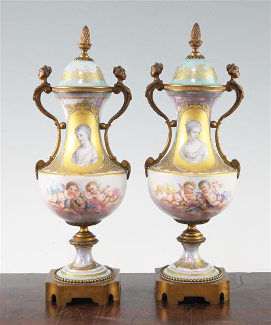 A pair of Sevres style porcelain and ormolu mounted vases and covers, late 19th / early 20th century, 31cm, one cover chipped